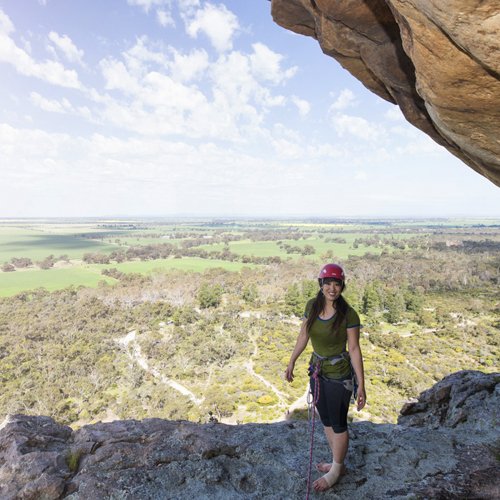 Angi Kim wearing our Merino Fusion short sleeve top at Mount Araphiles